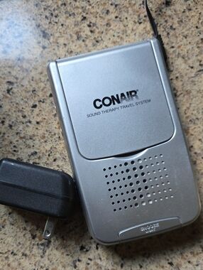 Portable Silver Electronic Device with Power Adapter Alarm Radio And White Noise